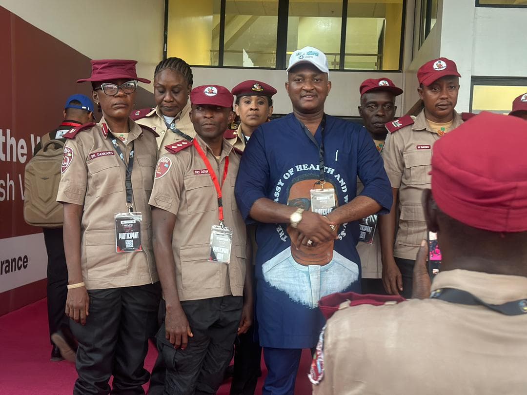 The Embassy of Health and Wellness engaging with Federal Road Safety Corps officers at a road safety event